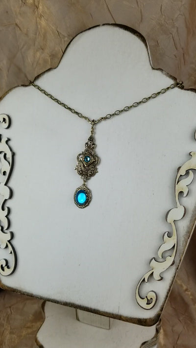 Video: Avalon Pendant Necklace in Aqua and Antiqued Brass by Rabbitwood and Reason 